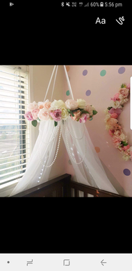 Sheer decorative floral bed canopy